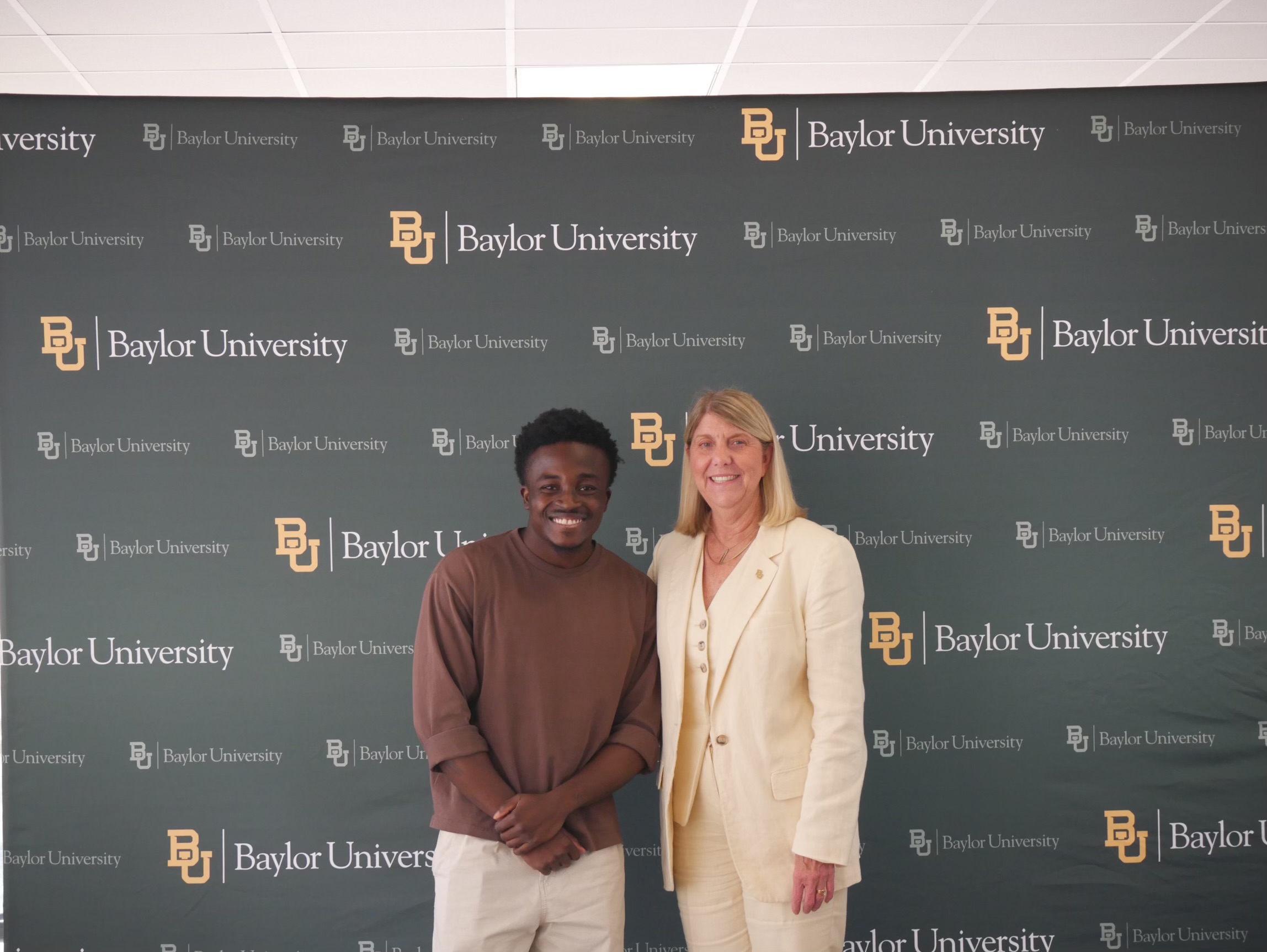 Daniel with Baylor's president at international student orientation